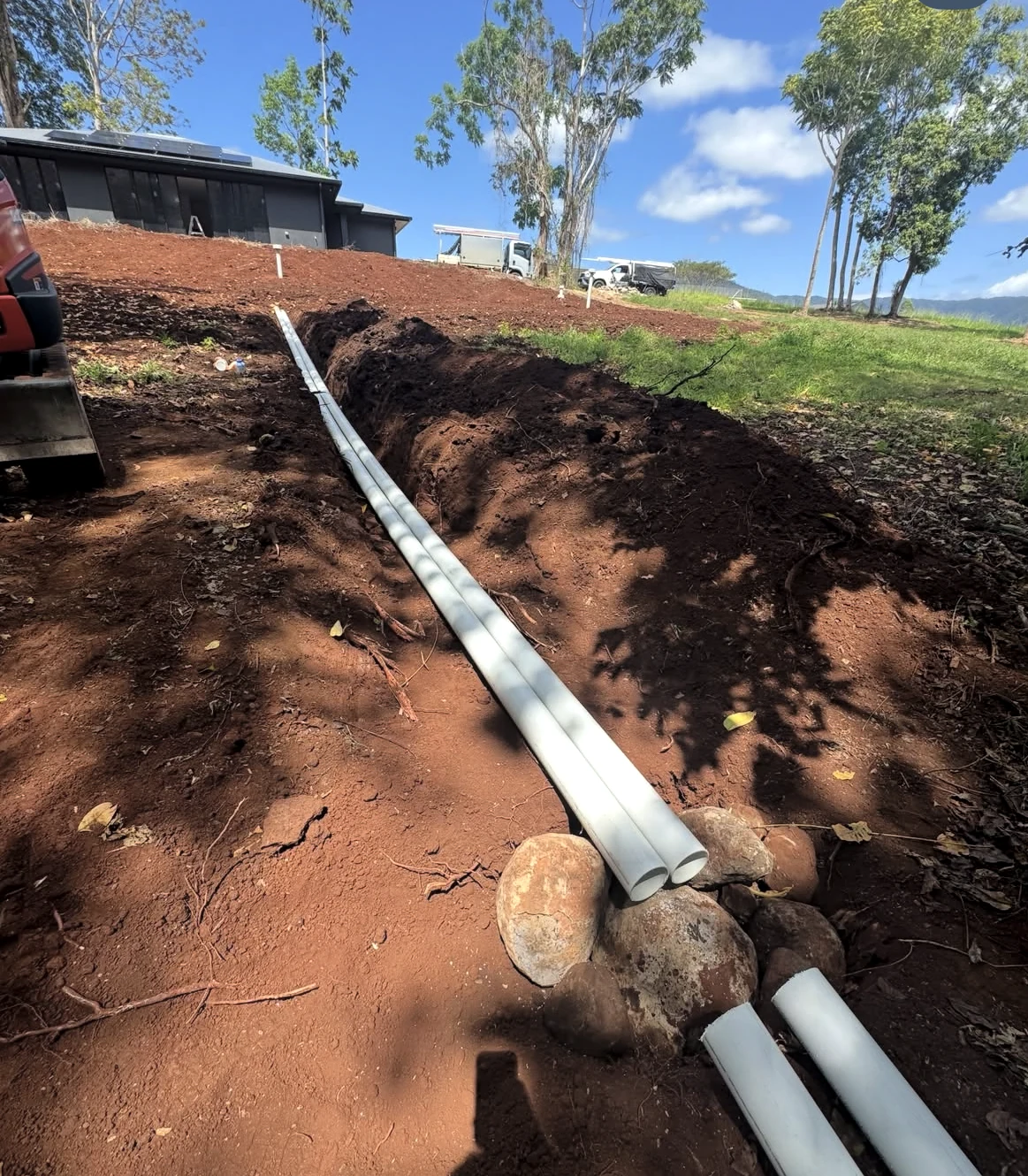 Stormwater drain and rock pit in freshly excavated ground