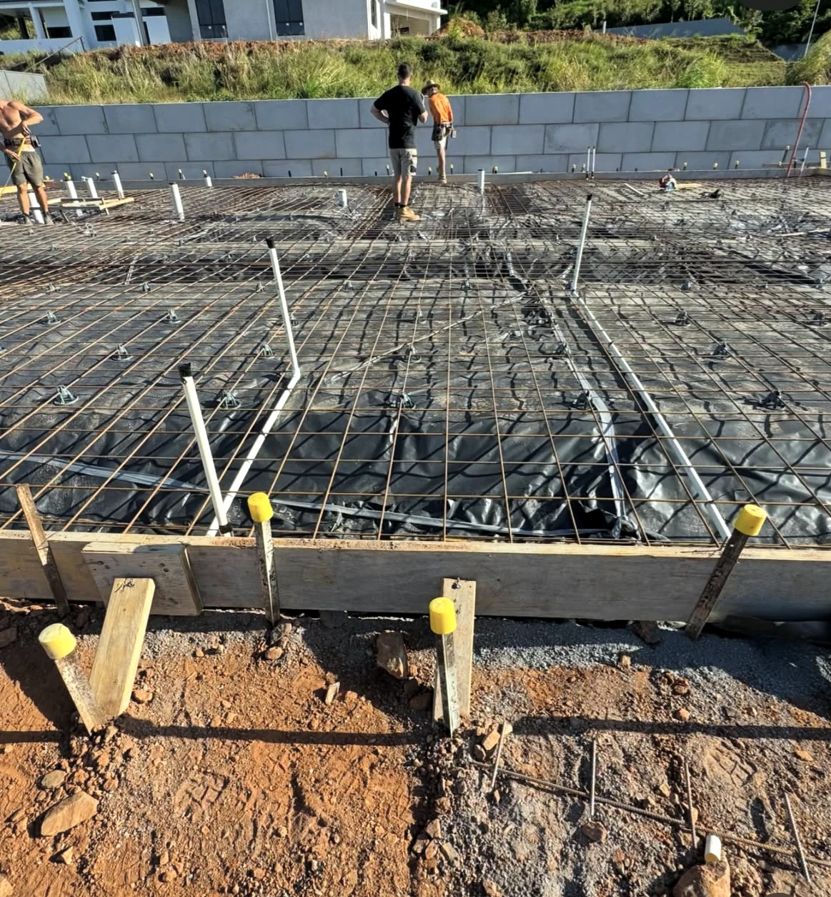 Under-slab work in progress before a concrete pour